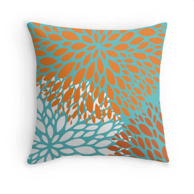 orange and turquoise pillow